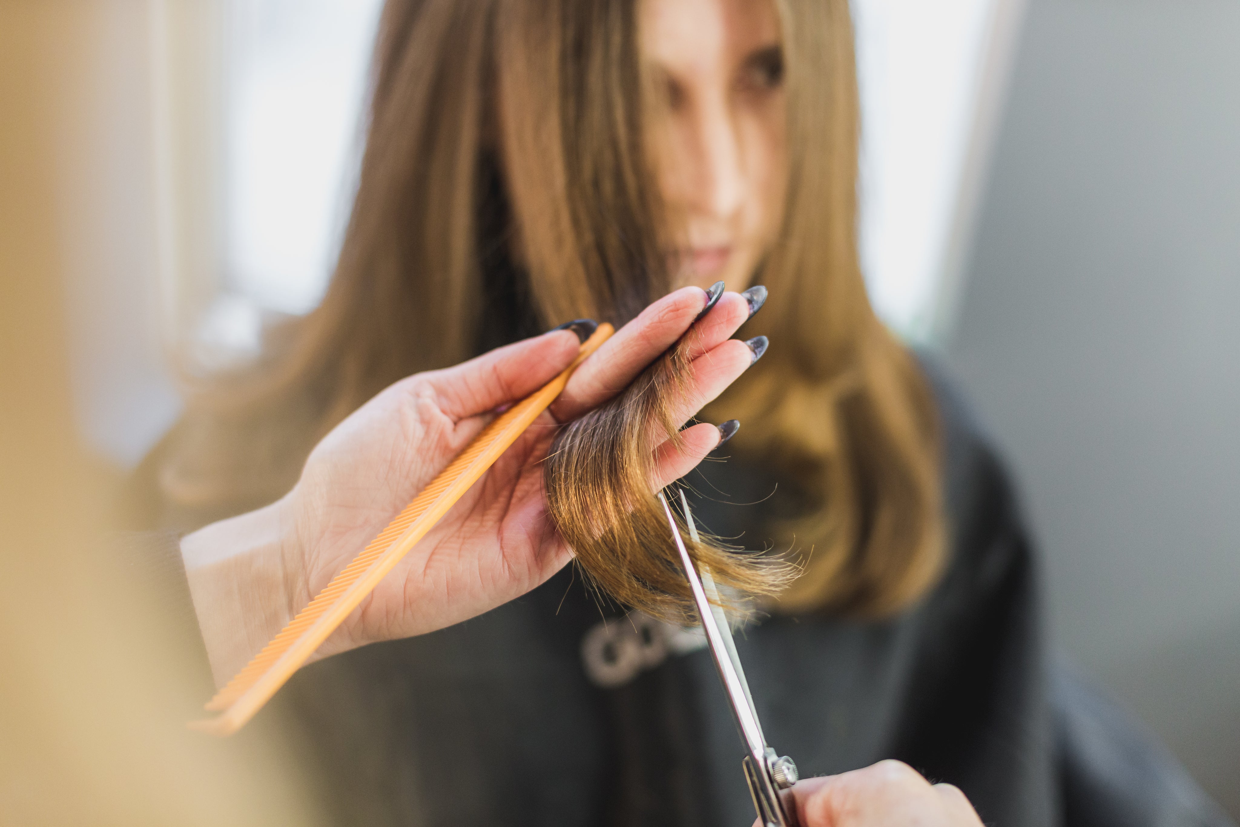 Elite Beauty Solutions Distribution Texas Base   Woman Getting Hair Cut At Salon 